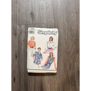 Simplicity pattern # 7169-misses'button front shirts-sizes 6-14-uncut pattern